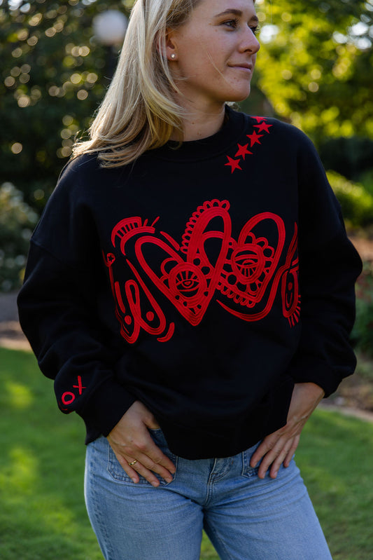 Embroidered Black Woof Crewneck